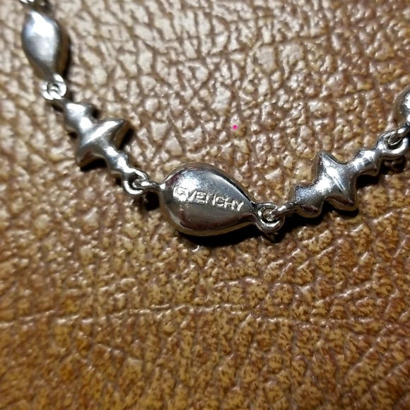 Givenchy silvertone and rhinestone tennis bracelet - Picture 3 of 7